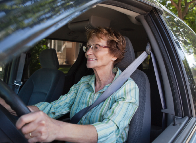 A senior citizen driving